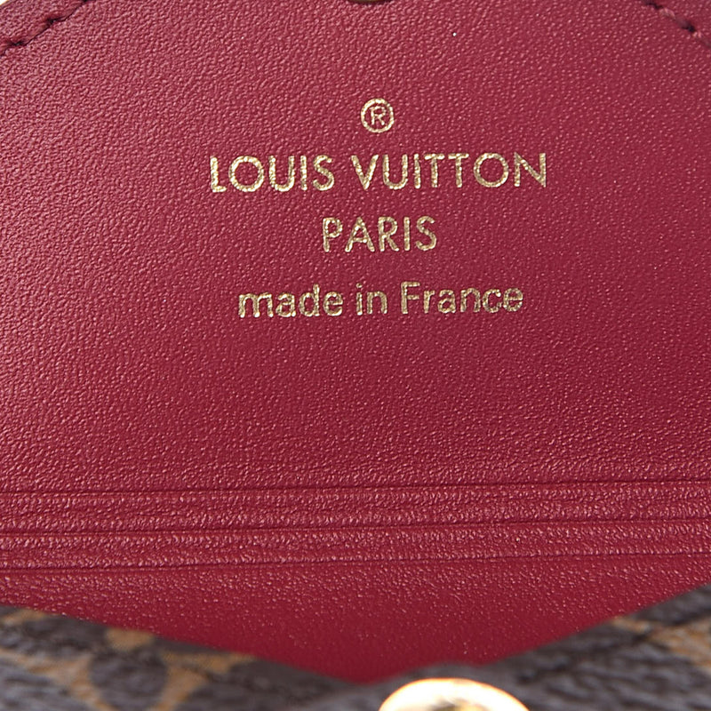 Louis Vuitton Kirigami medium Clutch Monogram passport holder