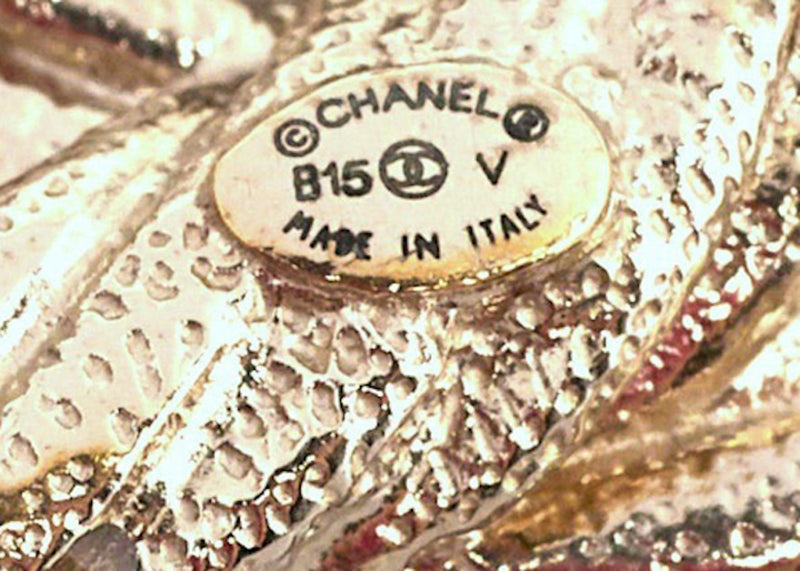 authentic chanel brooch stamp
